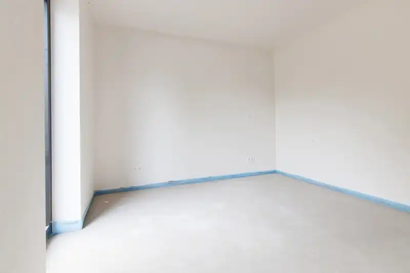 Ruim gelijkvloers nieuwbouwappartement met 4 slaapkamers en 2 badkamers, ruim terras en een mooie tuin op een goed bereikbare locatie! foto 13