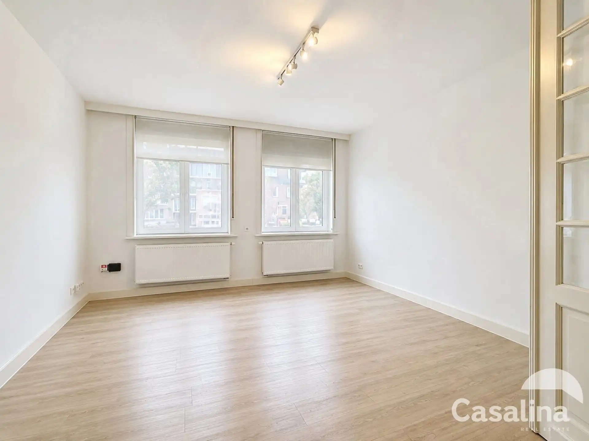 Luxe gelijkvloersappartement met stadstuin en garage box foto 6