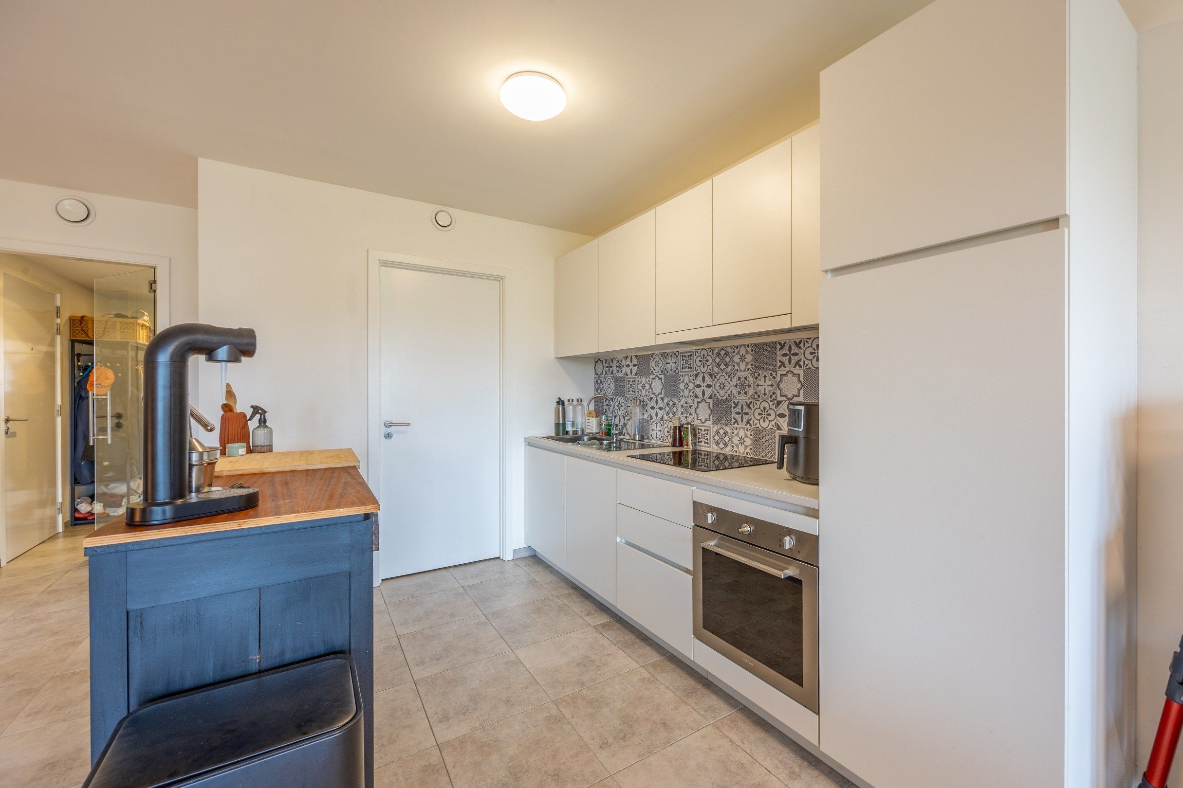 Gelijkvloers appartement met tuintje & staanplaats! foto 8