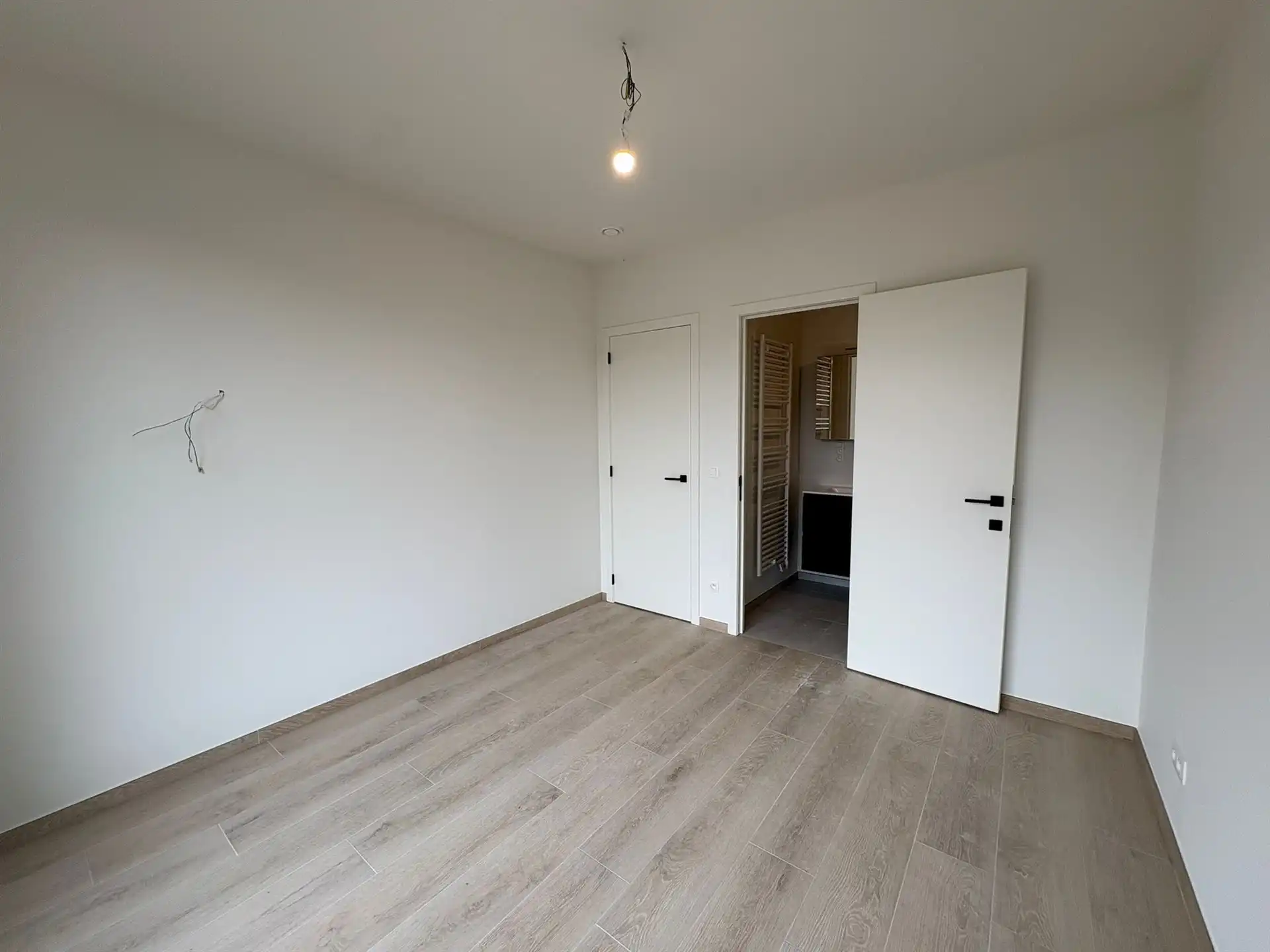 Te huur: Modern 1-slaapkamer appartement in nieuwbouwproject Tuinen van Eden, Wilrijk foto 10