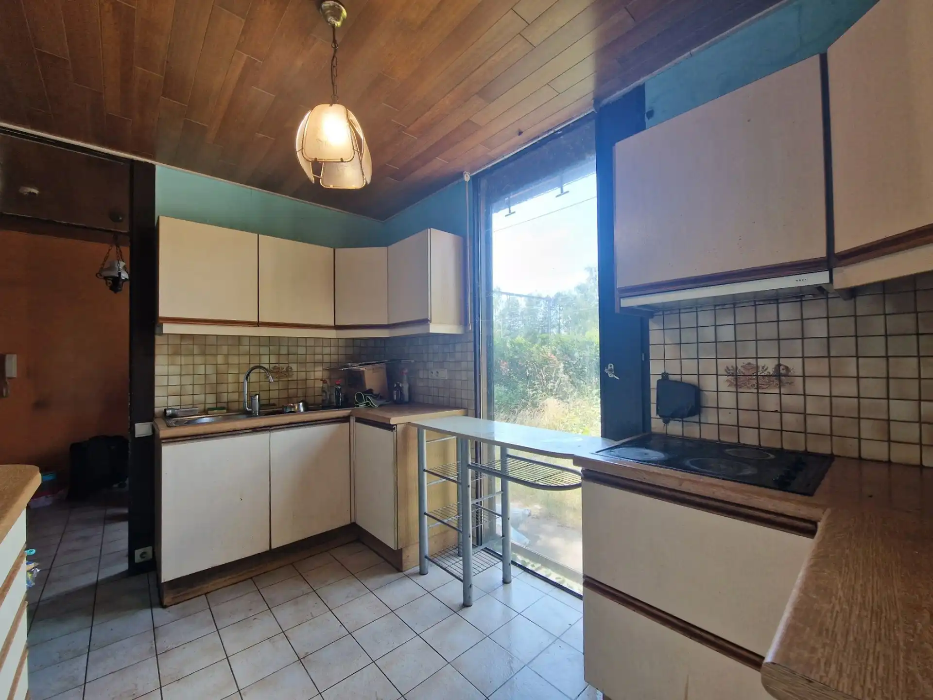 Gelijkvloerse, te renoveren woning op 10 are  foto 7