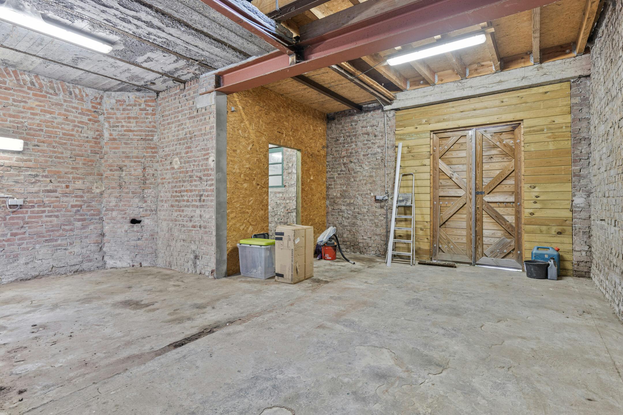Alleenstaande woning met magazijn te koop in Oudenaarde foto 17