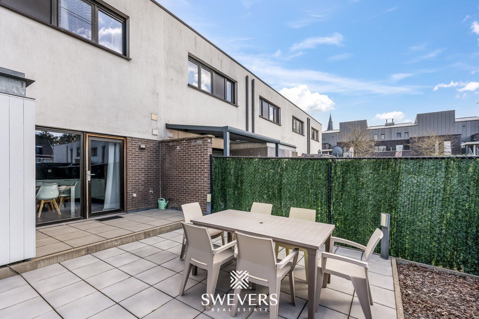 Energiezuinige en instapklare rijwoning met 3 slaapkamers en leuke tuin in hartje Koersel foto 5