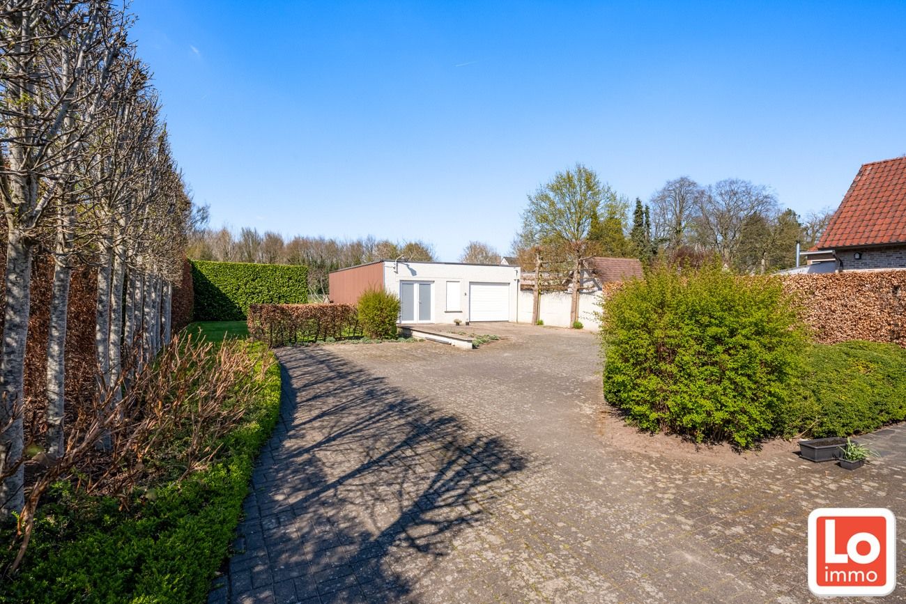 Prachtige eigendom op 1774m² met ruime garage/magazijn en 5 slaapkamers foto 24