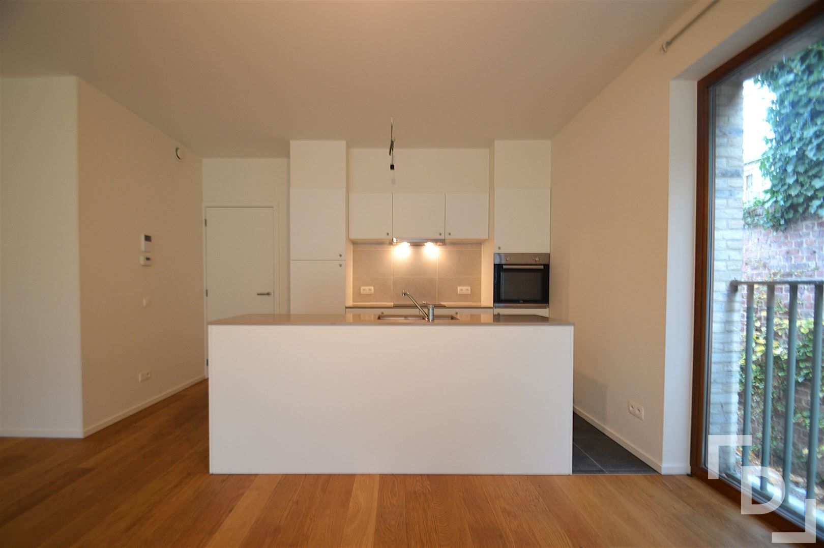 Gelijkvloers appartement met tuintje. foto 2