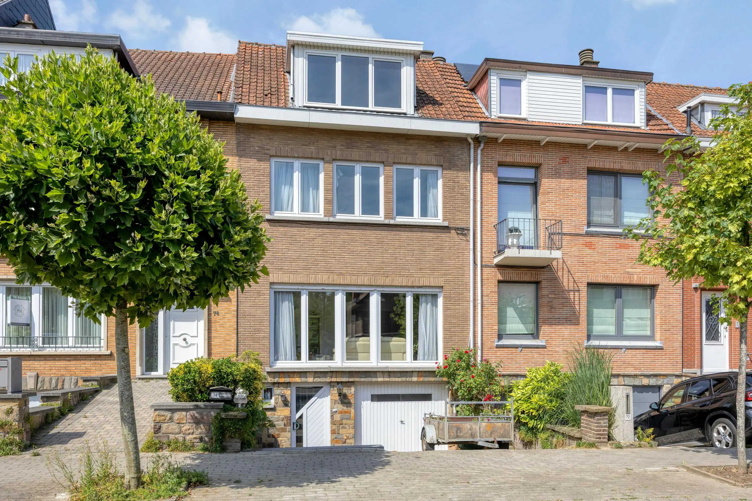 Gezinswoning te koop in Strombeek-Bever met tuin en garage foto {{pictureIndex}}