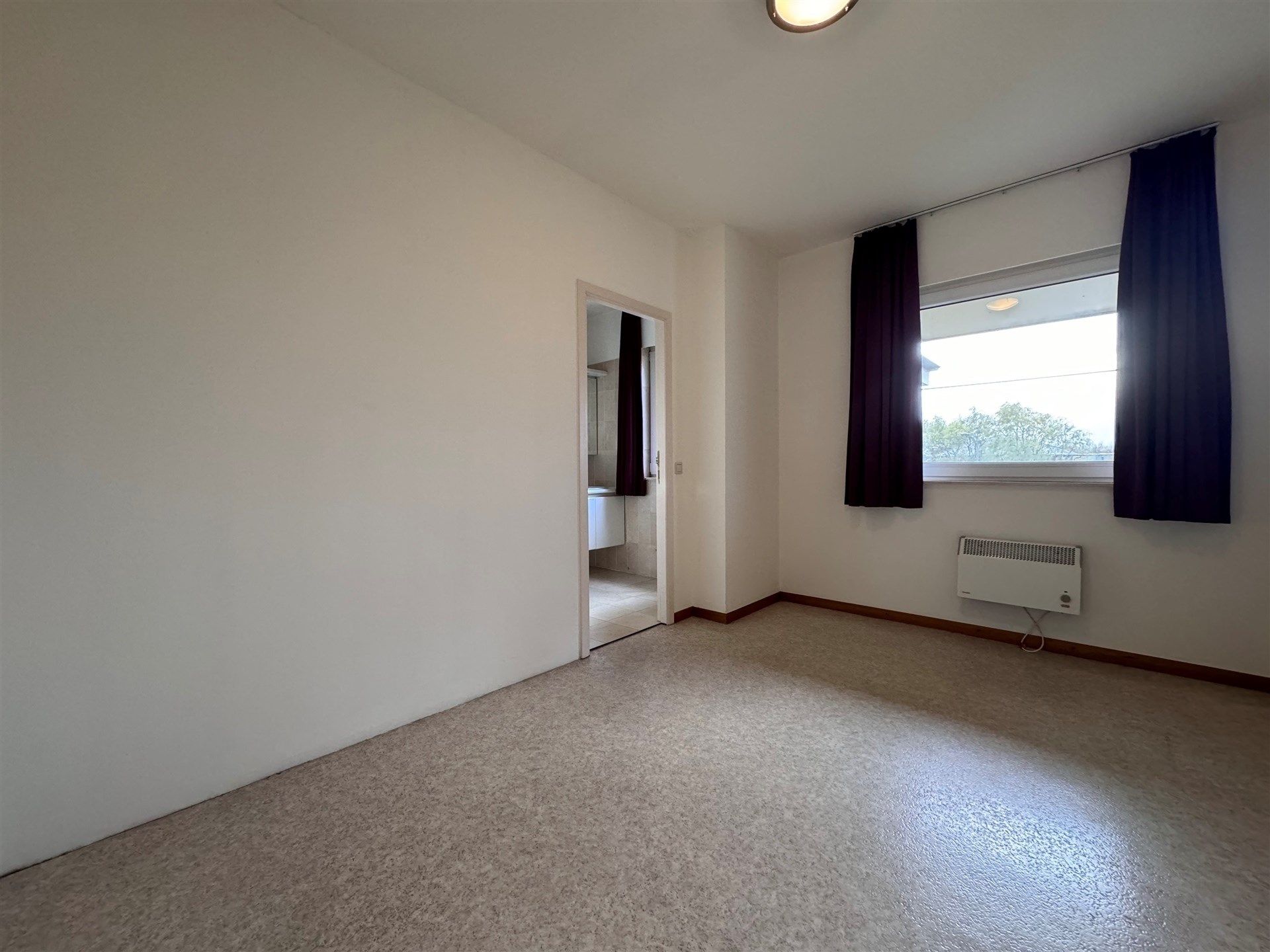 Lichtrijk appartement met ondergrondse garage en twee terrassen. foto 17
