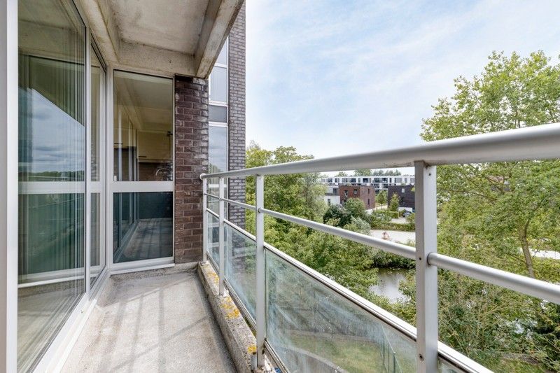 Gerenoveerd appartement met ondergrondse autostaanplaats TE KOOP in GENT! foto 18