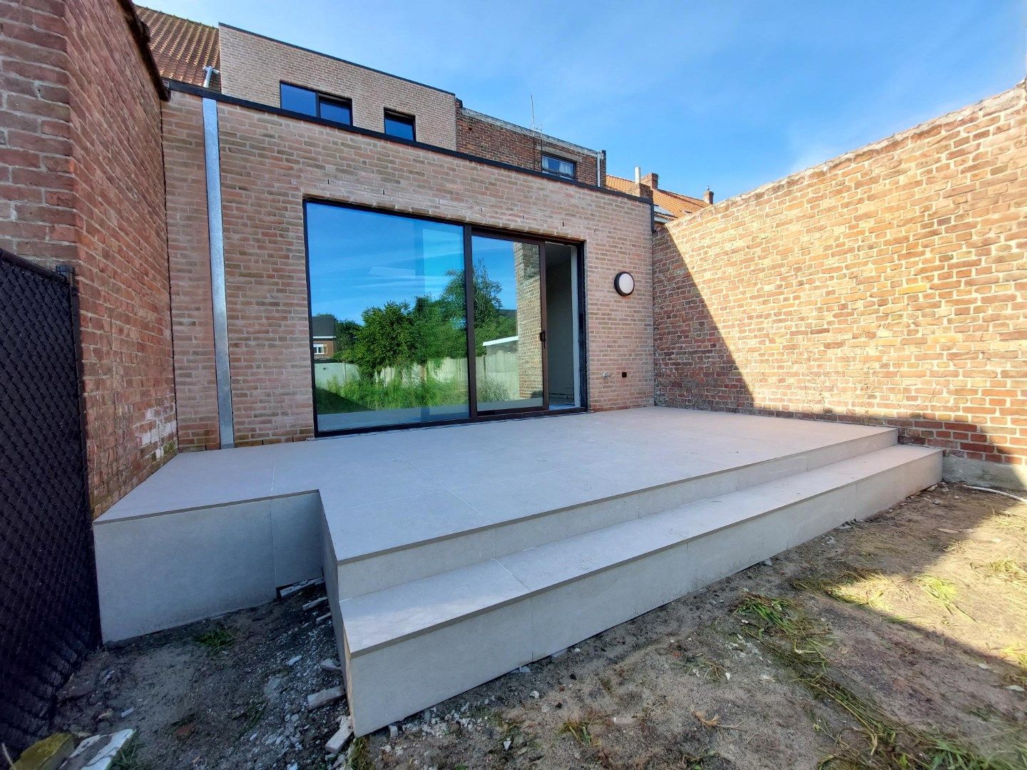 Gelijkvloersappartement met terras en tuin  foto 3