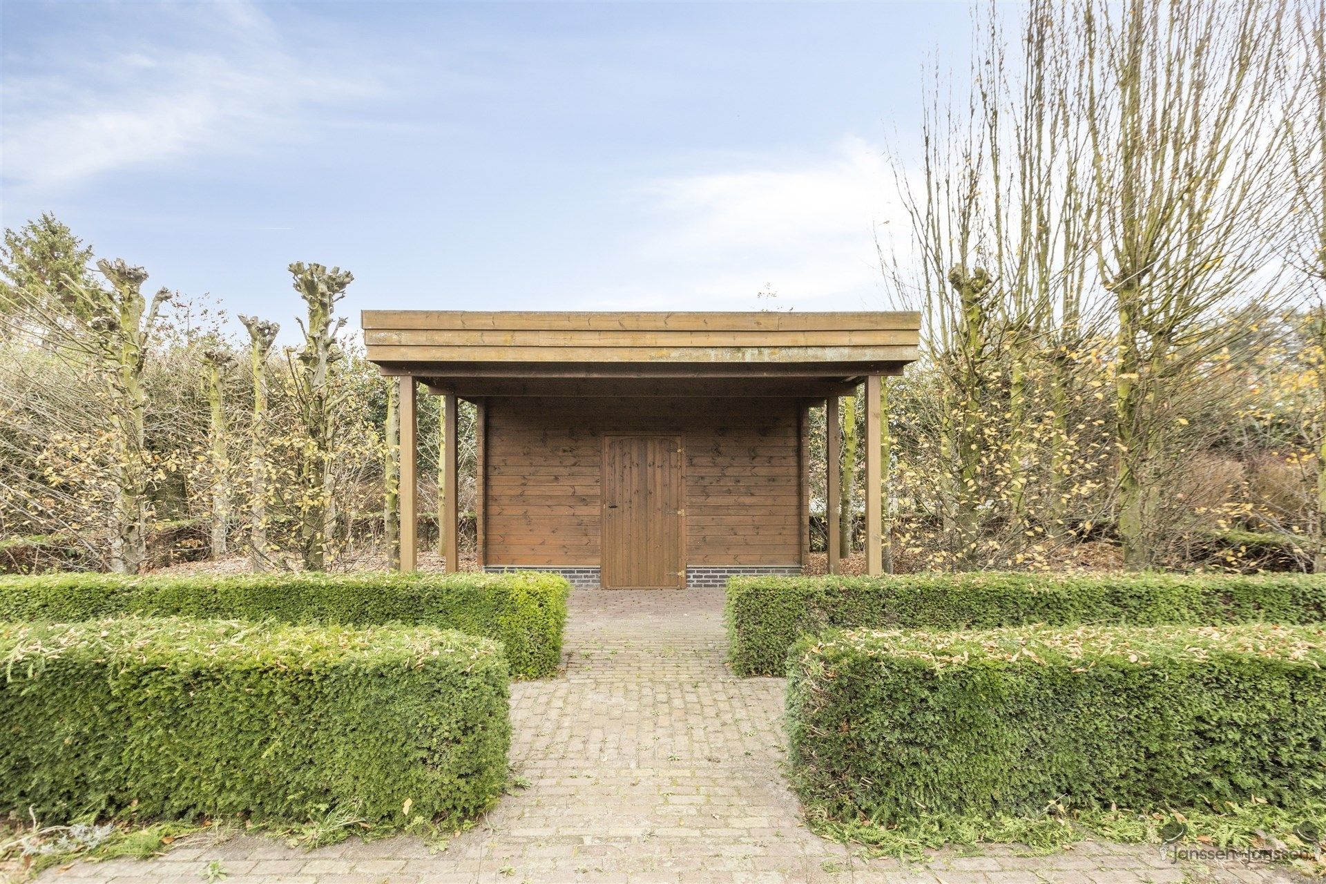 Ruime, goed onderhouden woning met prachtige tuin in Elsum Geel foto 32