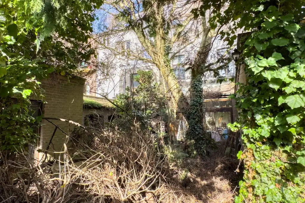 Ruim te renoveren woning met garage en zuidgerichte tuin op een boogscheut van het stadscentrum. foto 5