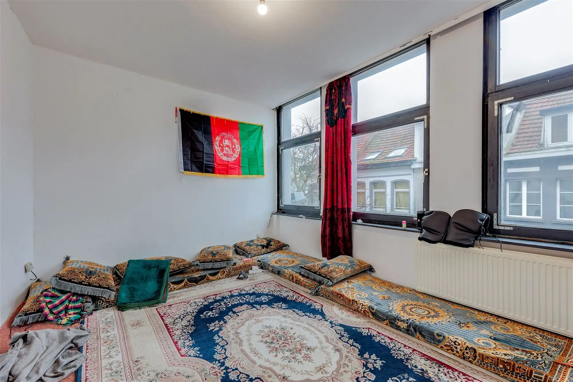 Hoekpand bestaande uit handelsglvl + 6 appartementen foto 21