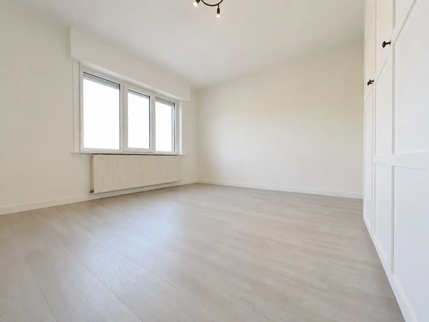 Centraal gelegen rijwoning met 4 slaapkamers en tuin.  foto 8