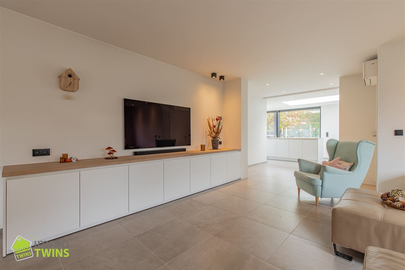 Gezellige open bebouwing met garage, tuin en oprit te Grembergen foto 2