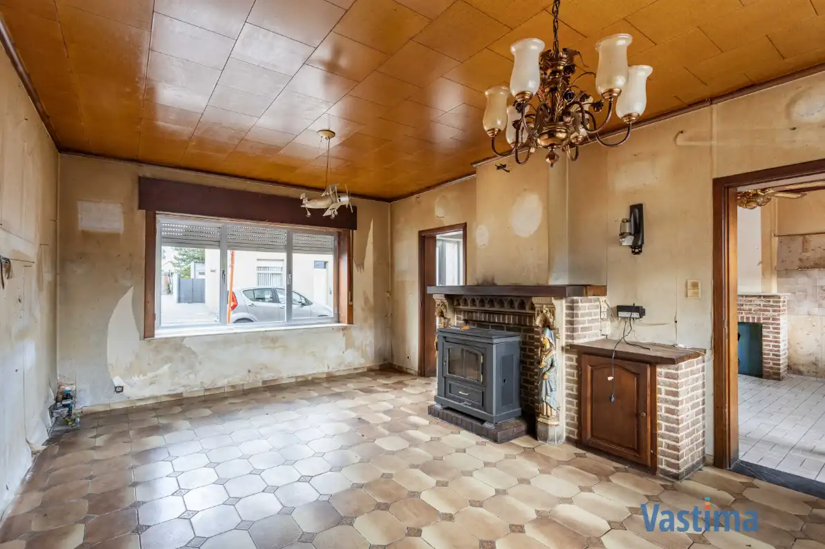 Te renoveren woning met 3 slaapkamers, garage en tuin foto 4