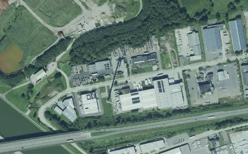 TE KOOP: Bedrijfssite met magazijnen, kantoren en buitenopslag in Tessenderlo-Ham foto 9
