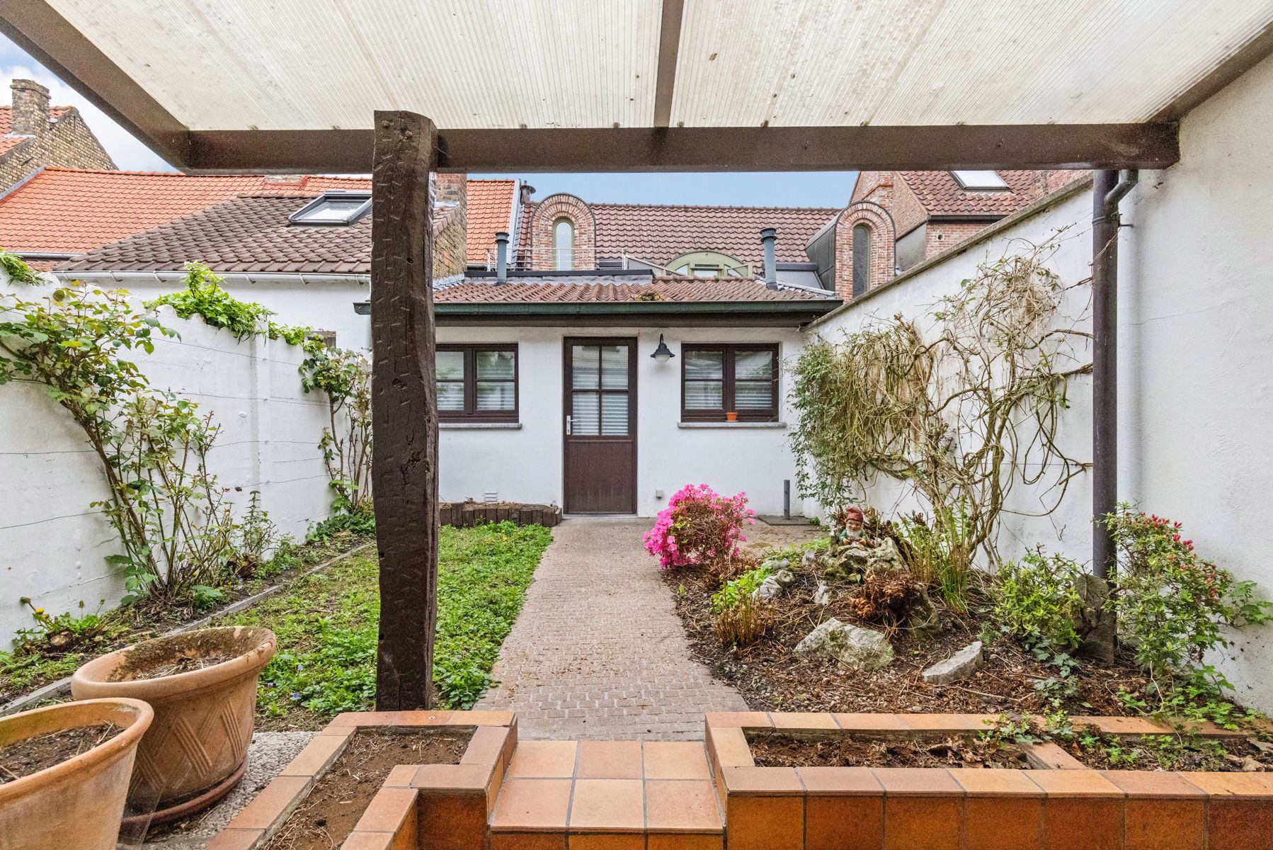 Charmante burgerwoning in hartje Brugge met tuin én zomerhuisje foto 9