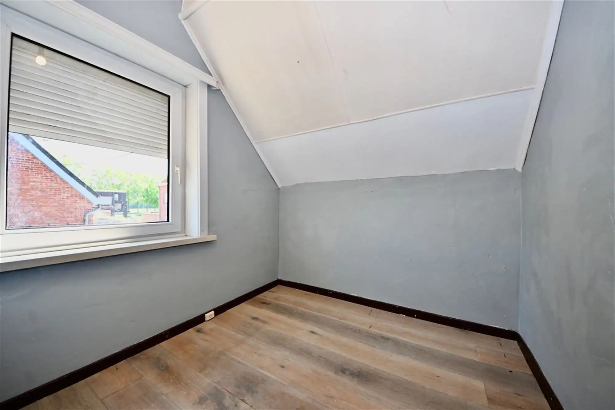 Te renoveren woning met 3 slaapkamers, garage en tuin.  foto 14