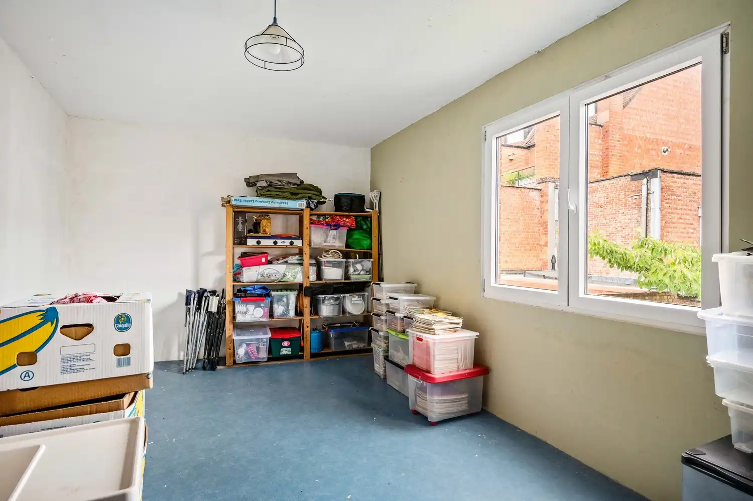 Instapklare woning met 4 slpkrs met gezellige stadstuin en garage foto 24