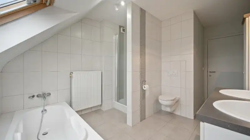 Ruim 3 slaapkamer appartement van 130m² met terras 14m² op zuid-oosten foto 12