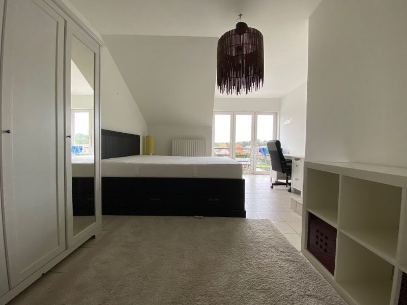 Ruim duplexappartement met 3 slaapkamers foto 6