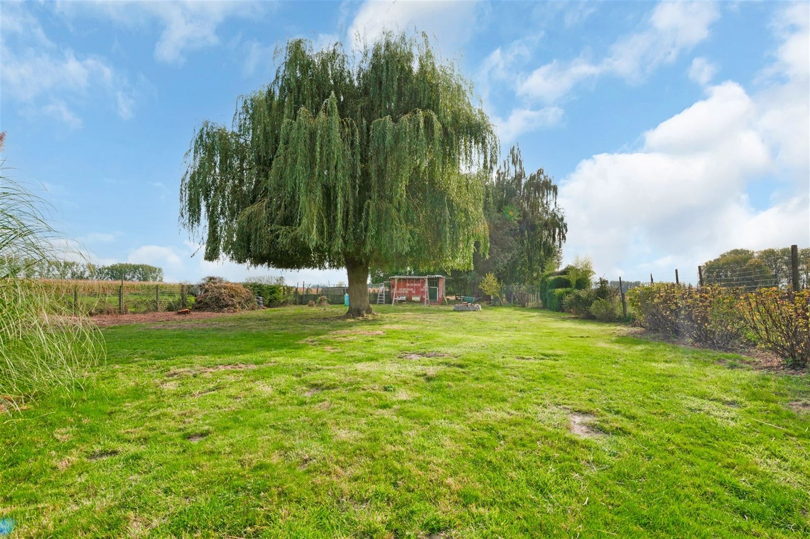 Gezellige gezinswonig met grote tuin op 27are20 foto 13