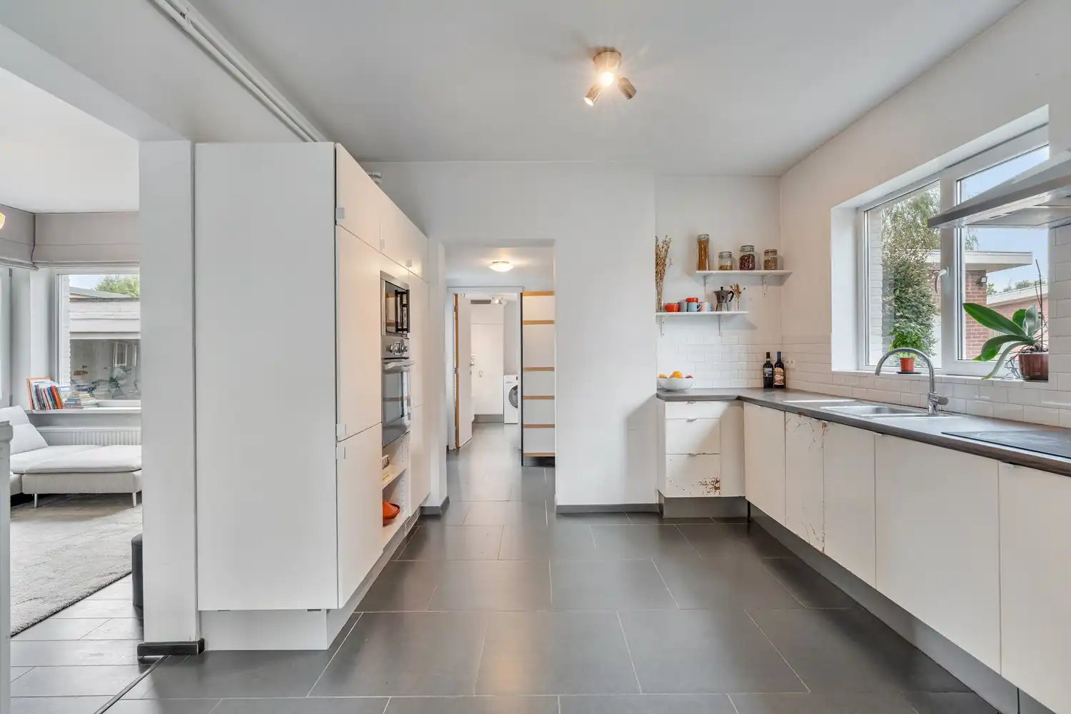 Goed gelegen, vrijstaande en lichtrijke woning met een oprit met een garage, 3 slaapkamers en een diepe tuin te Wilsele! foto 8