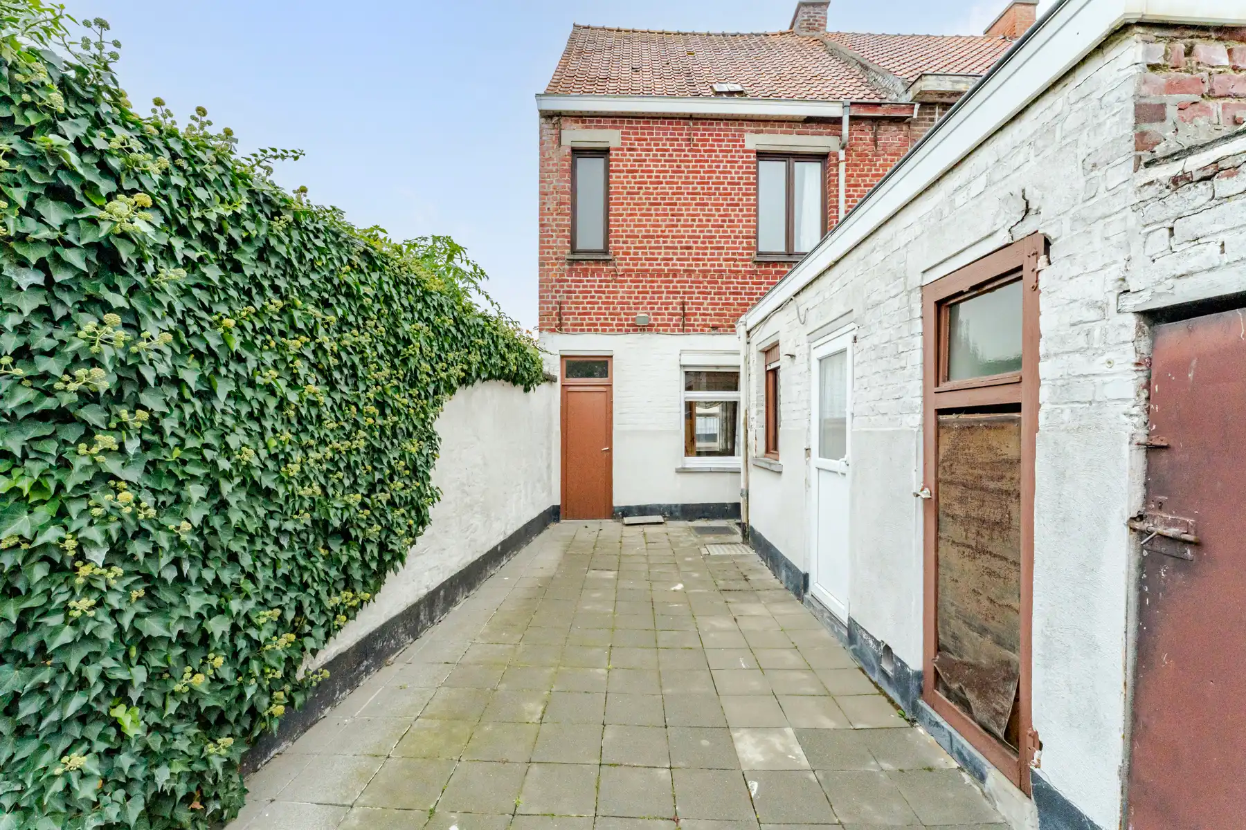 Centraal gelegen te renoveren woning met tuin foto 13