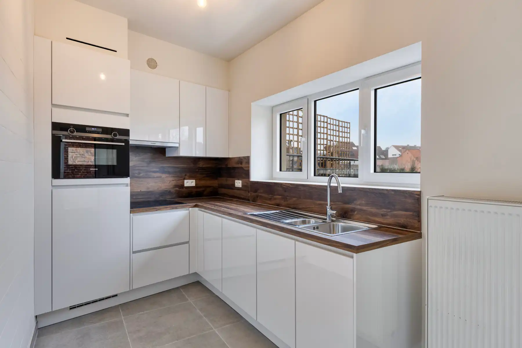 Instapklare woning met 3 slpk, garage en tuin! foto 9