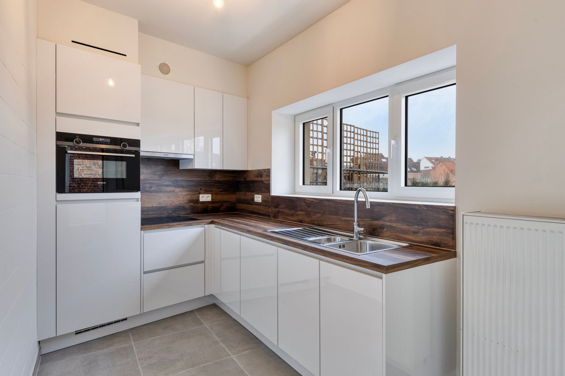 Instapklare woning met 3 slpk, garage en tuin! foto 9