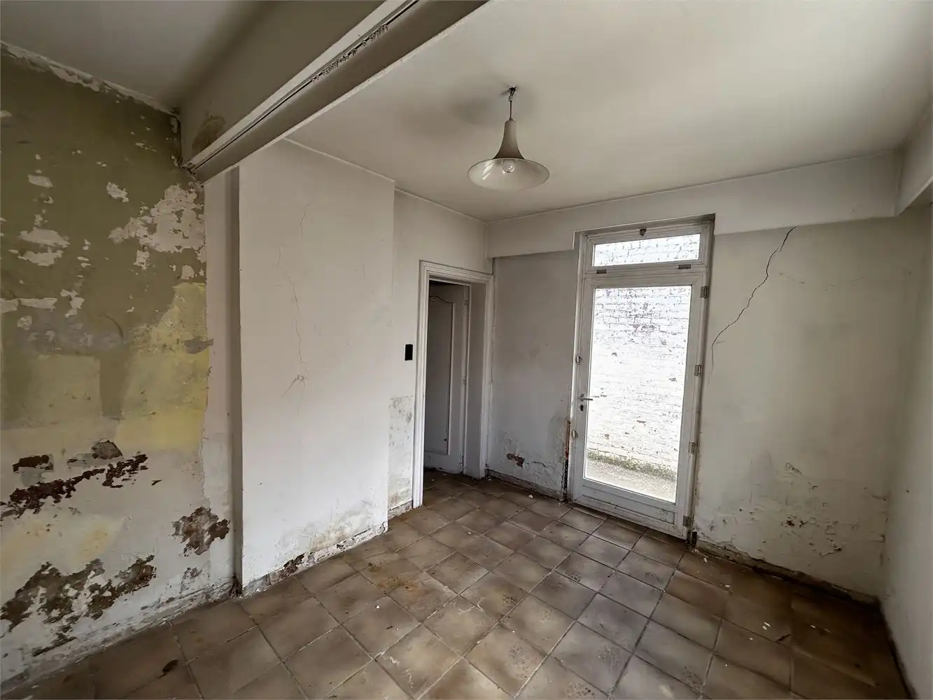 Te renoveren handelshuis met woonst foto 19