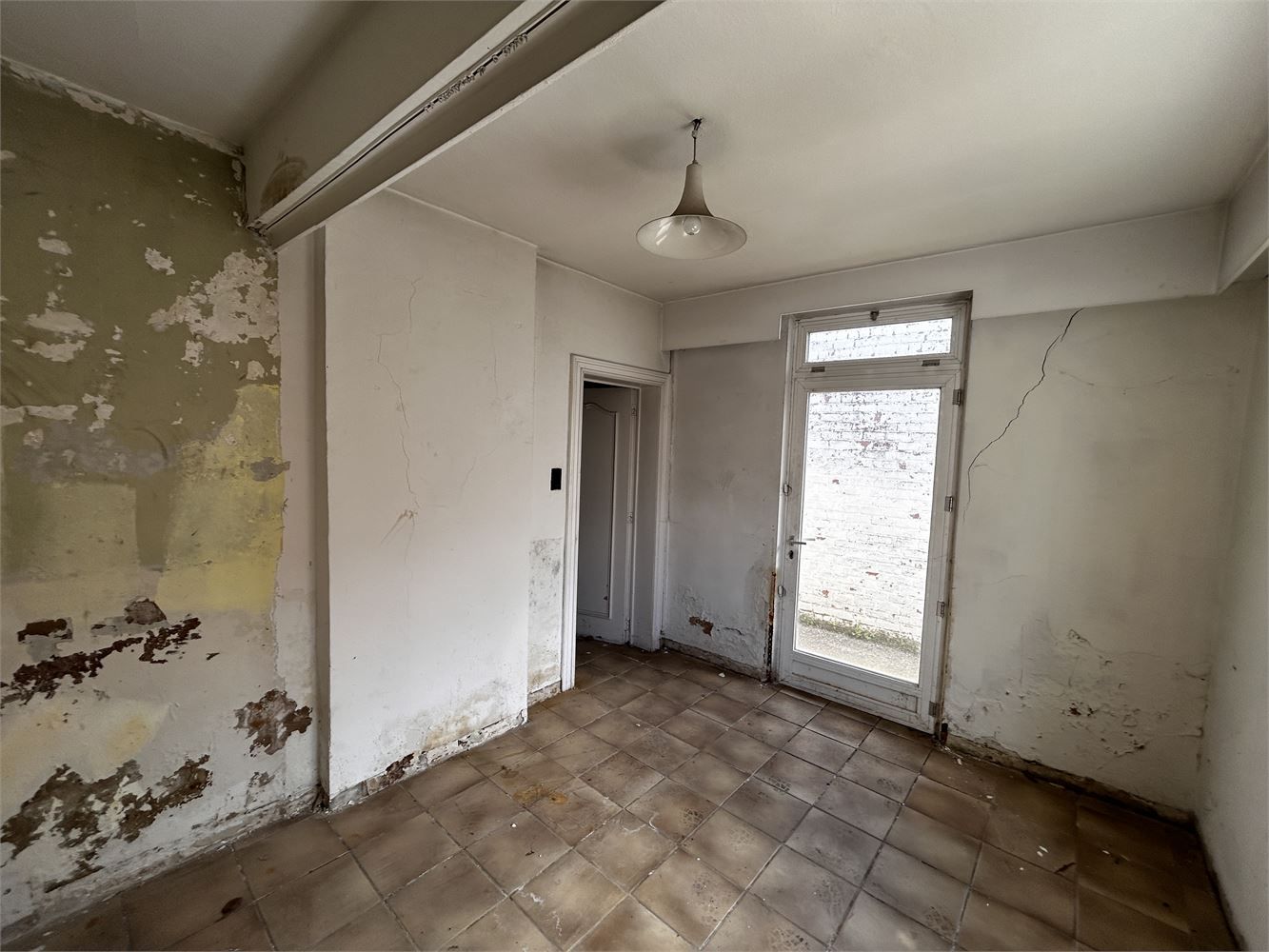 Te renoveren handelshuis met woonst foto 19