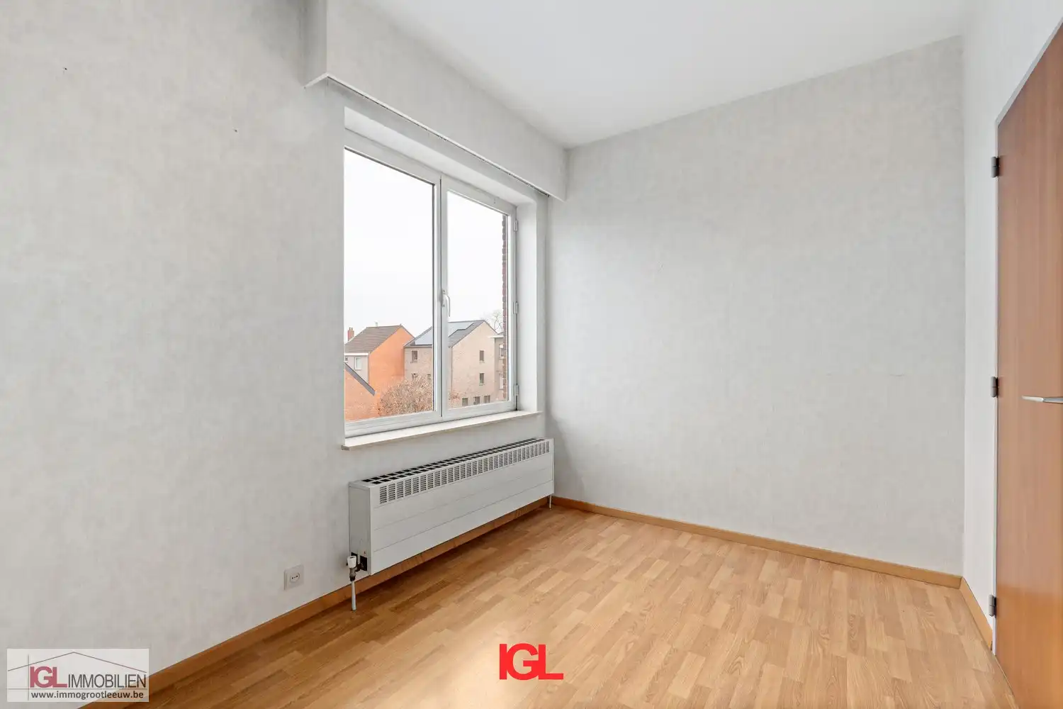 Lichtrijk 2-slaapkamerappartement met garagebox en kelder in Sint-Pieters-Leeuw foto 7