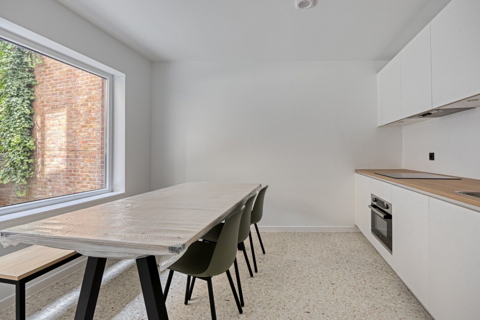 Volledig gerenoveerde studentenkamer in residentie met 29 studentenkamers met eigen sanitair en terras in hartje Leuven - EPC label A! foto 6