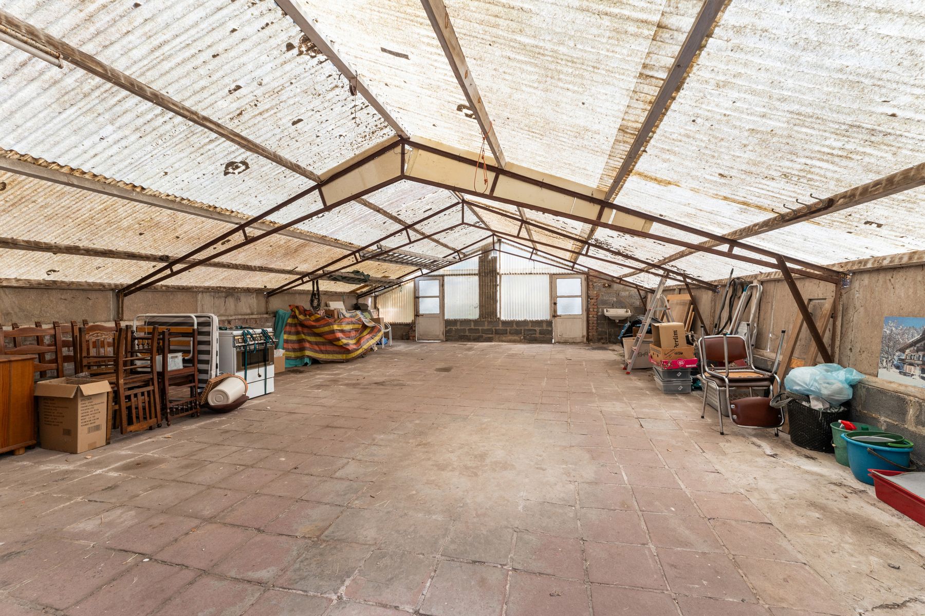 Ruime woning met gunstig EPC, grote tuin en loods foto 4