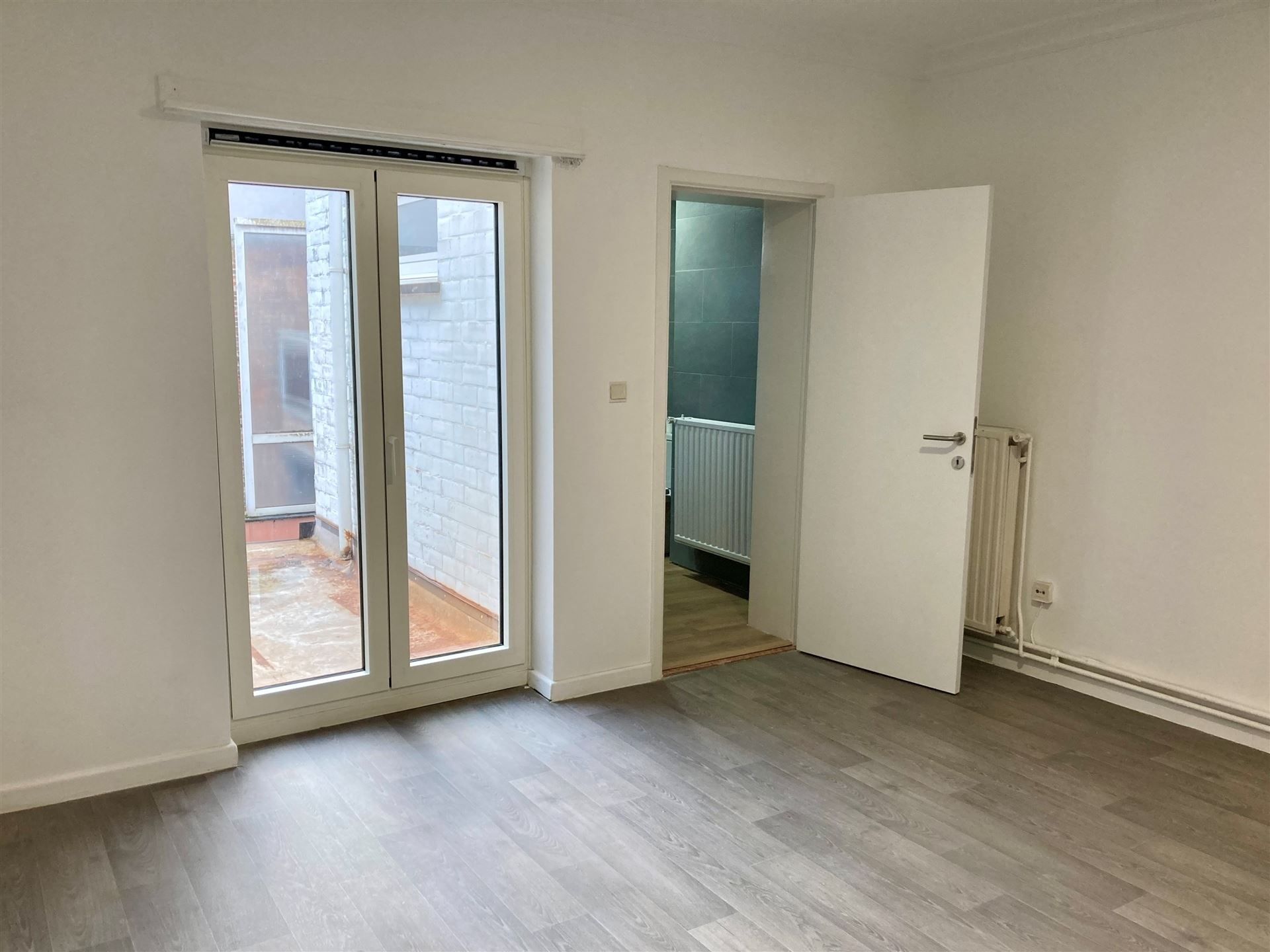 Duplex appartement met 2 slpks en terras in stadscentrum foto 13