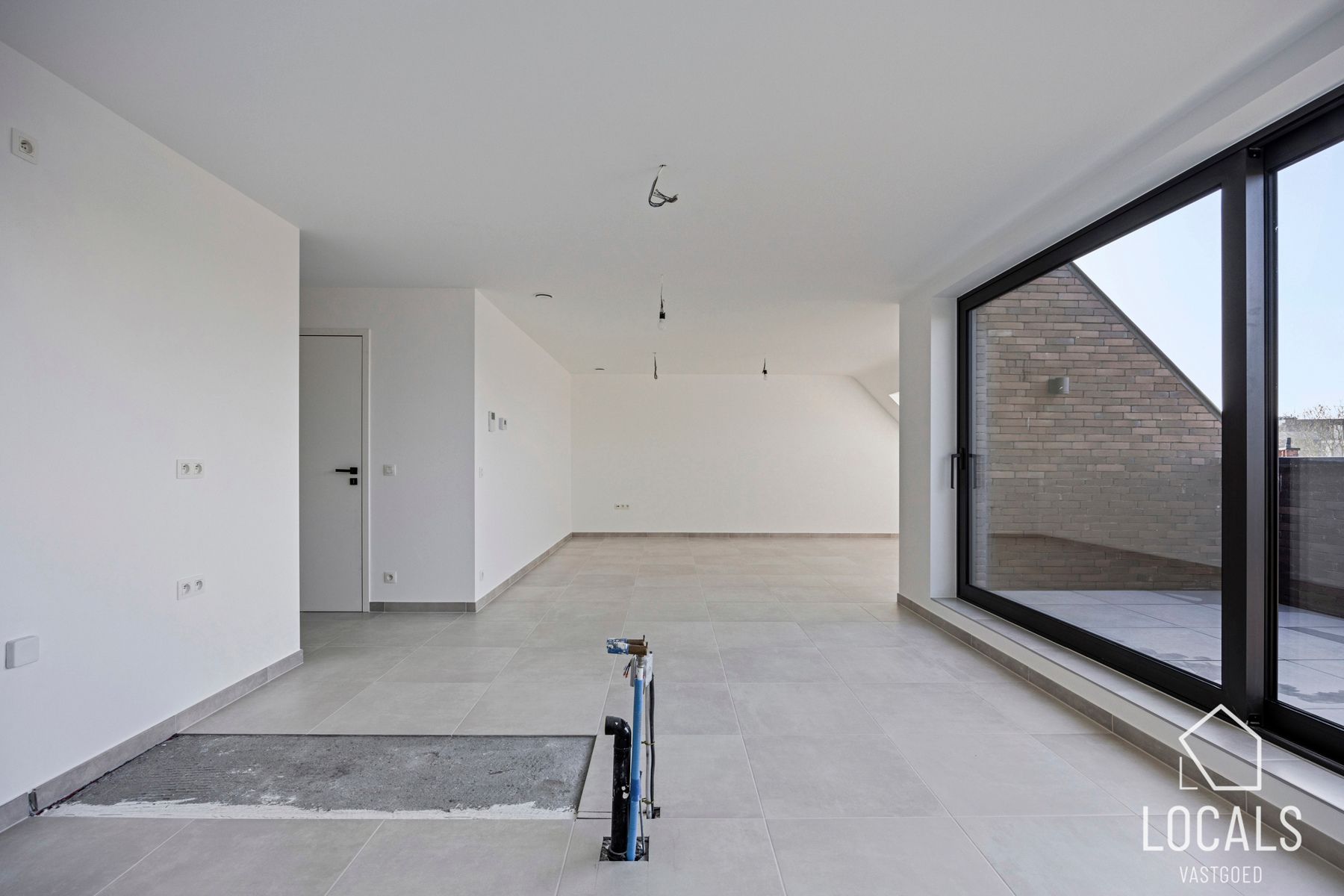 Modern en ruim duplexappartement met zonnig terras foto 2