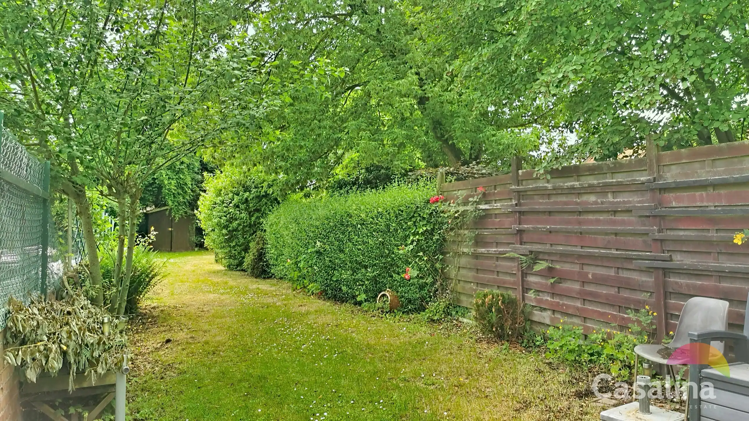 Bel-etagewoning met garage en tuin om op te frissen foto 7