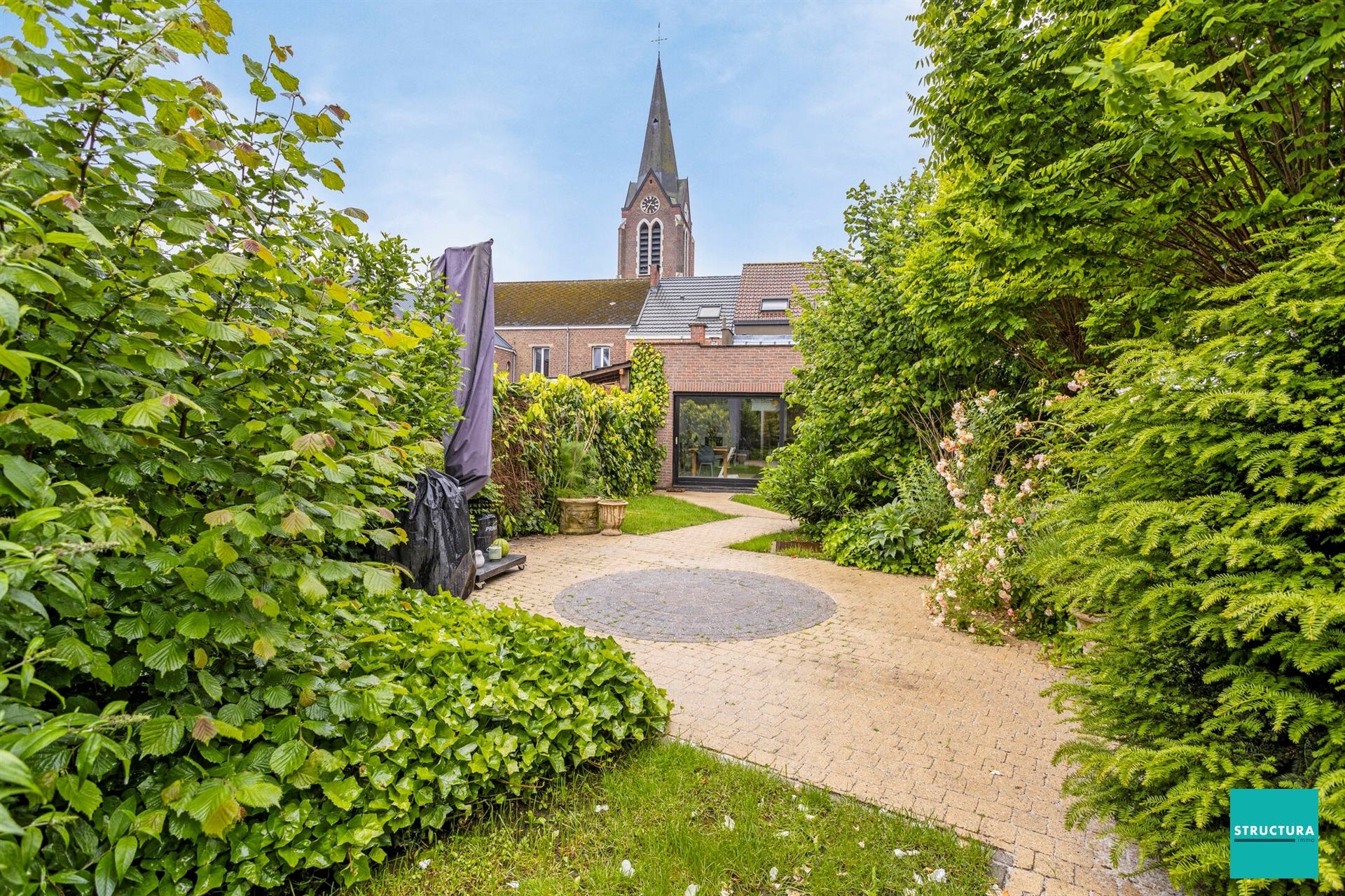 Veelzijdige woning met 4 slaapkamers en mooie tuin foto 10