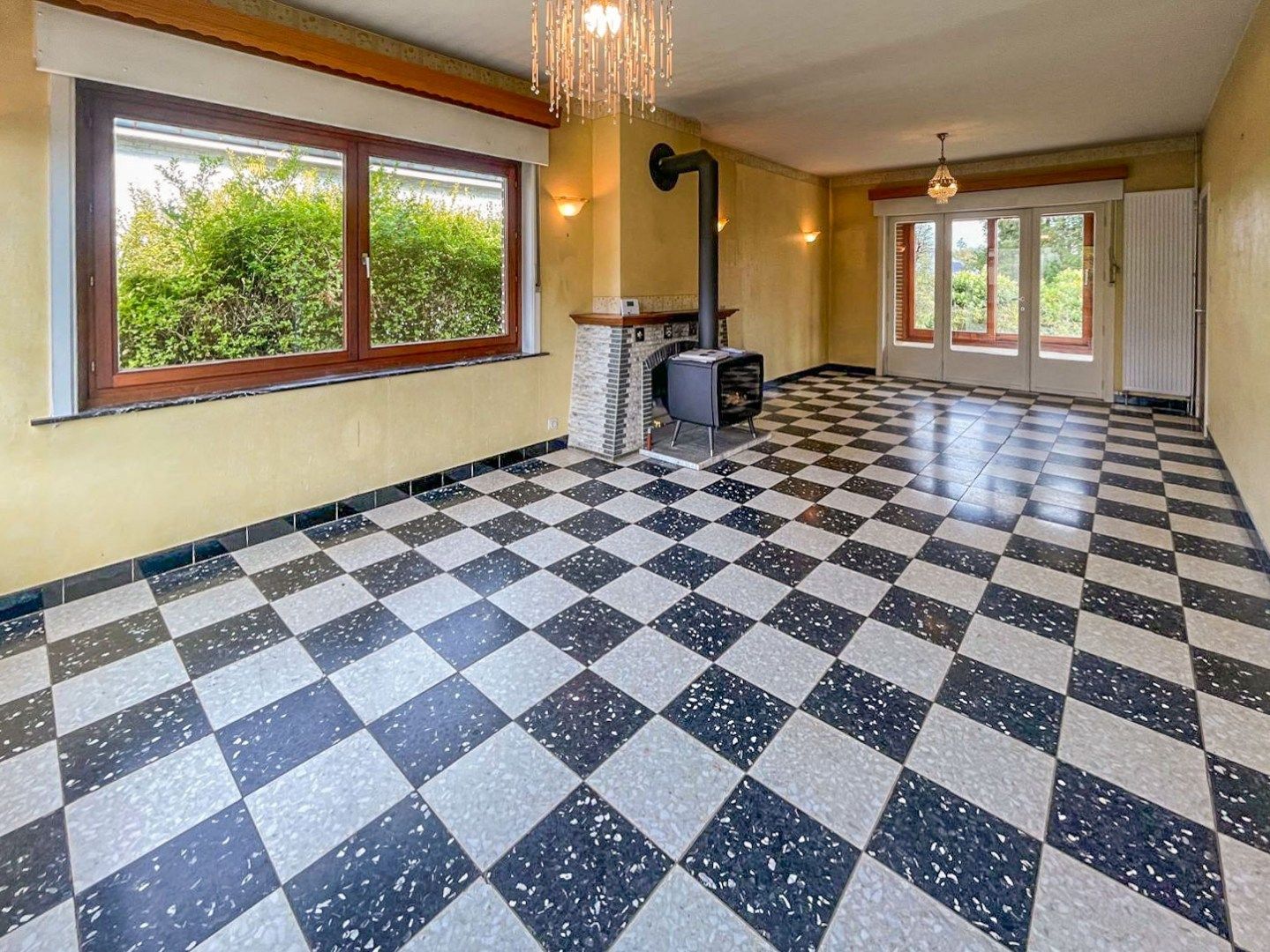 Te renoveren viergevelwoning met tuin foto 2