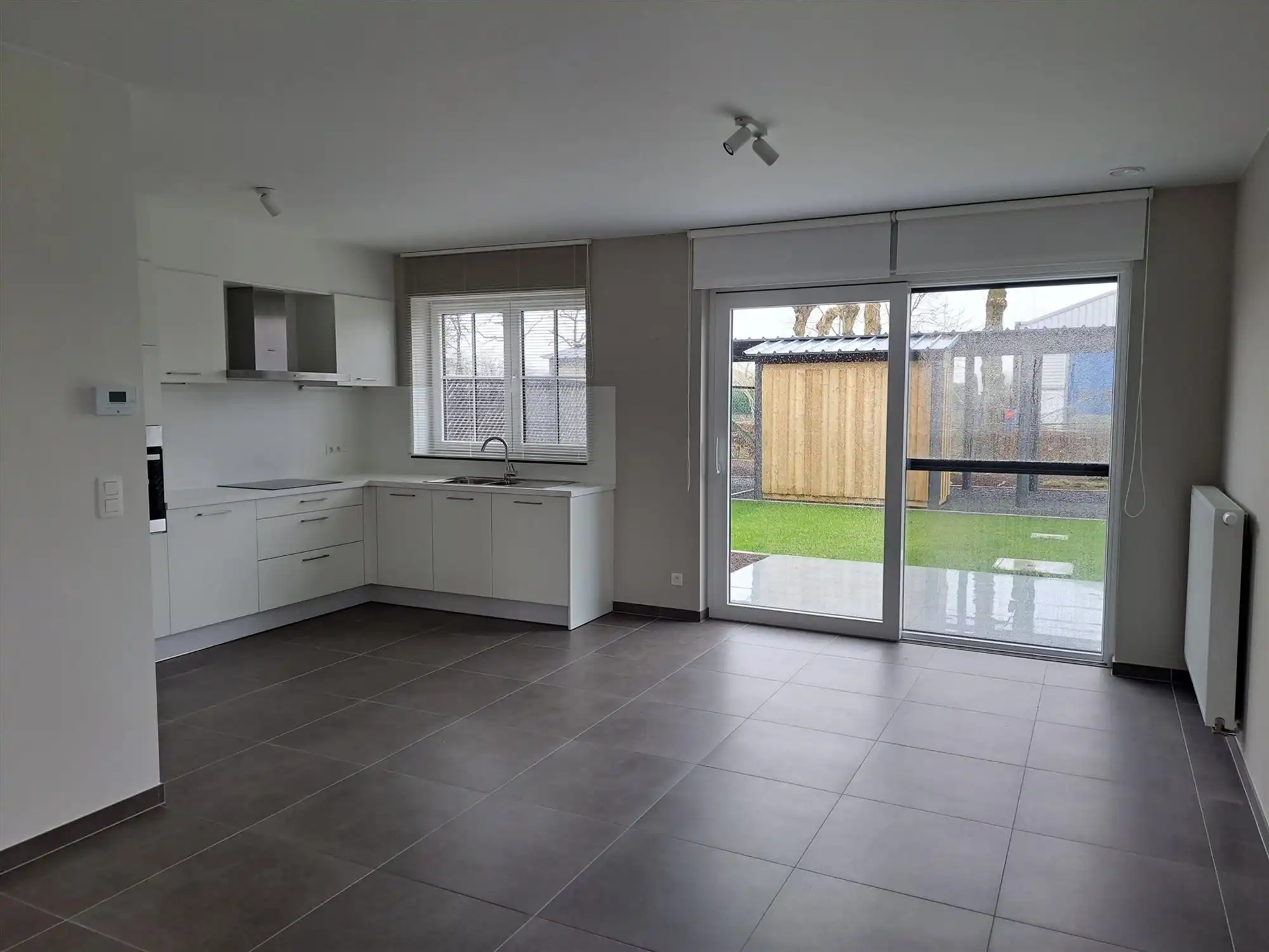 recente woning - tot in de puntjes afgewerkt - met 4 slaapkamers foto 4