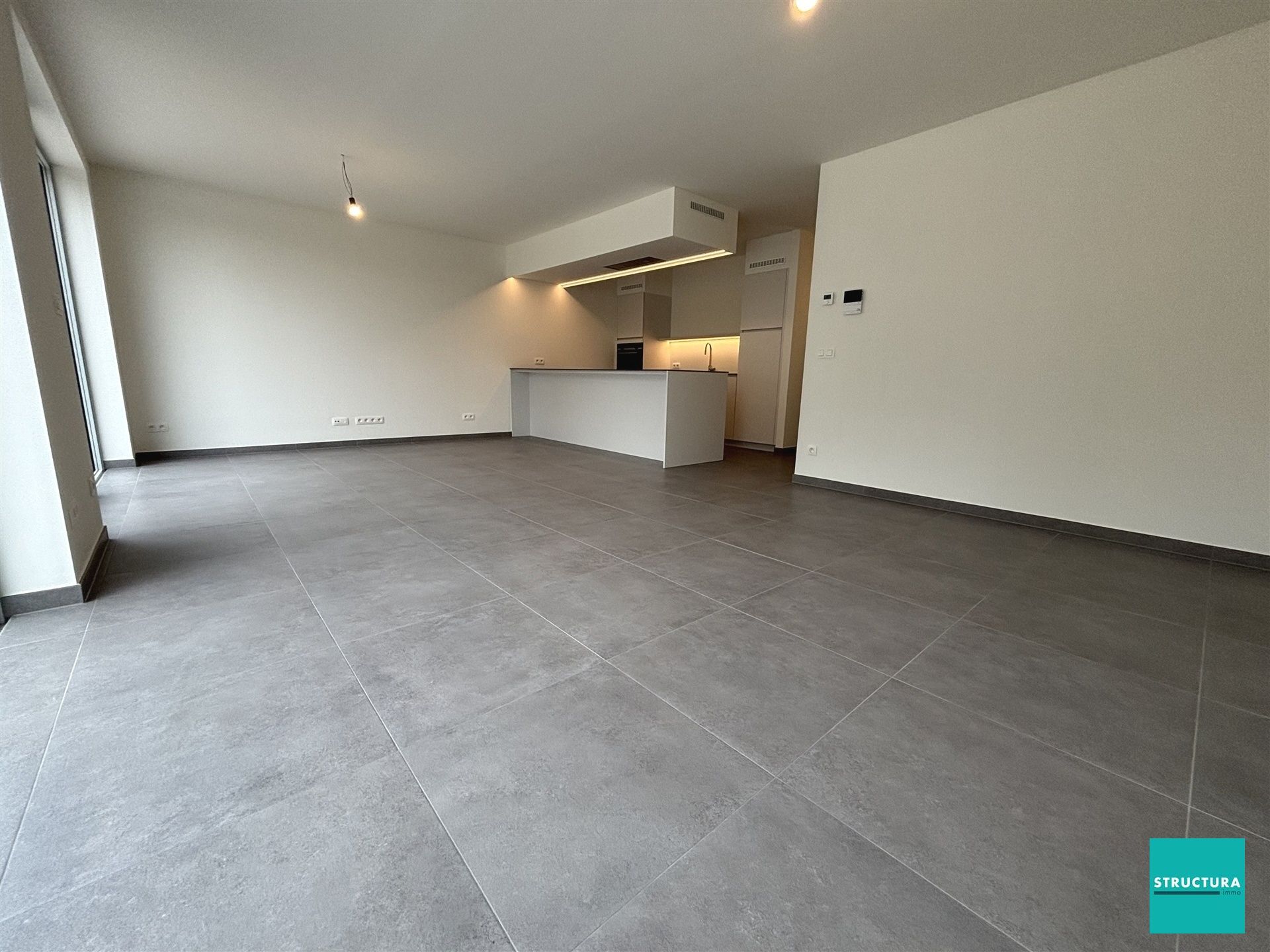 Ruim nieuwbouw appartement met tuin en staanplaats foto 2