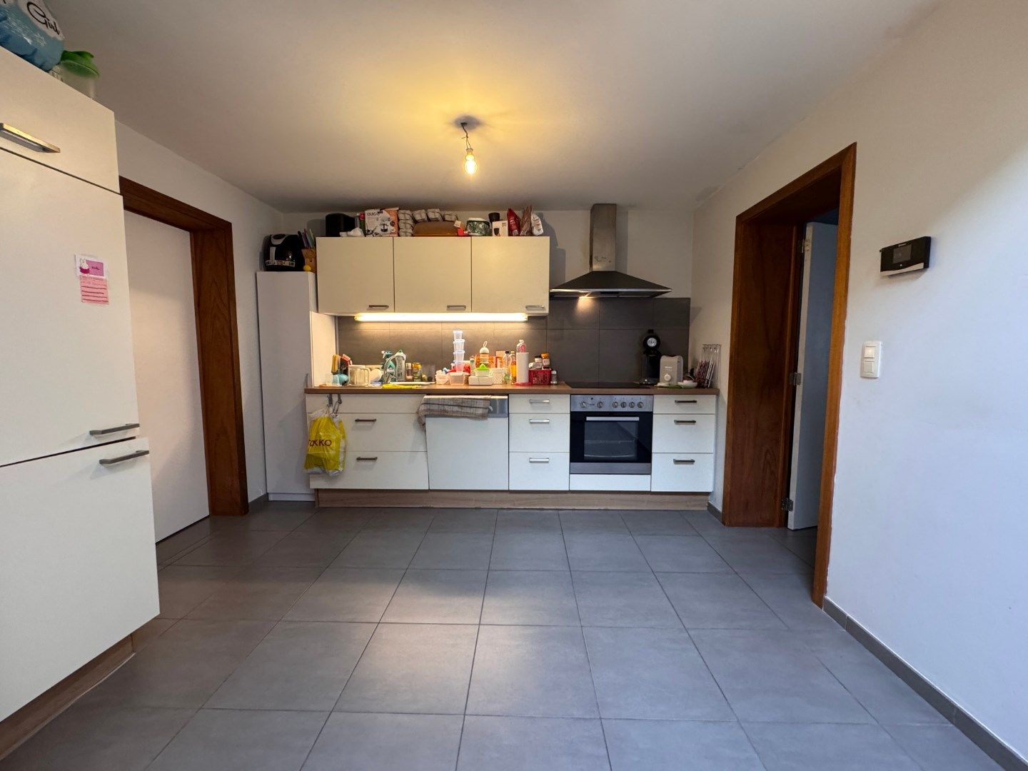 Ruime woning met tuin en magazijn/atelier foto 4