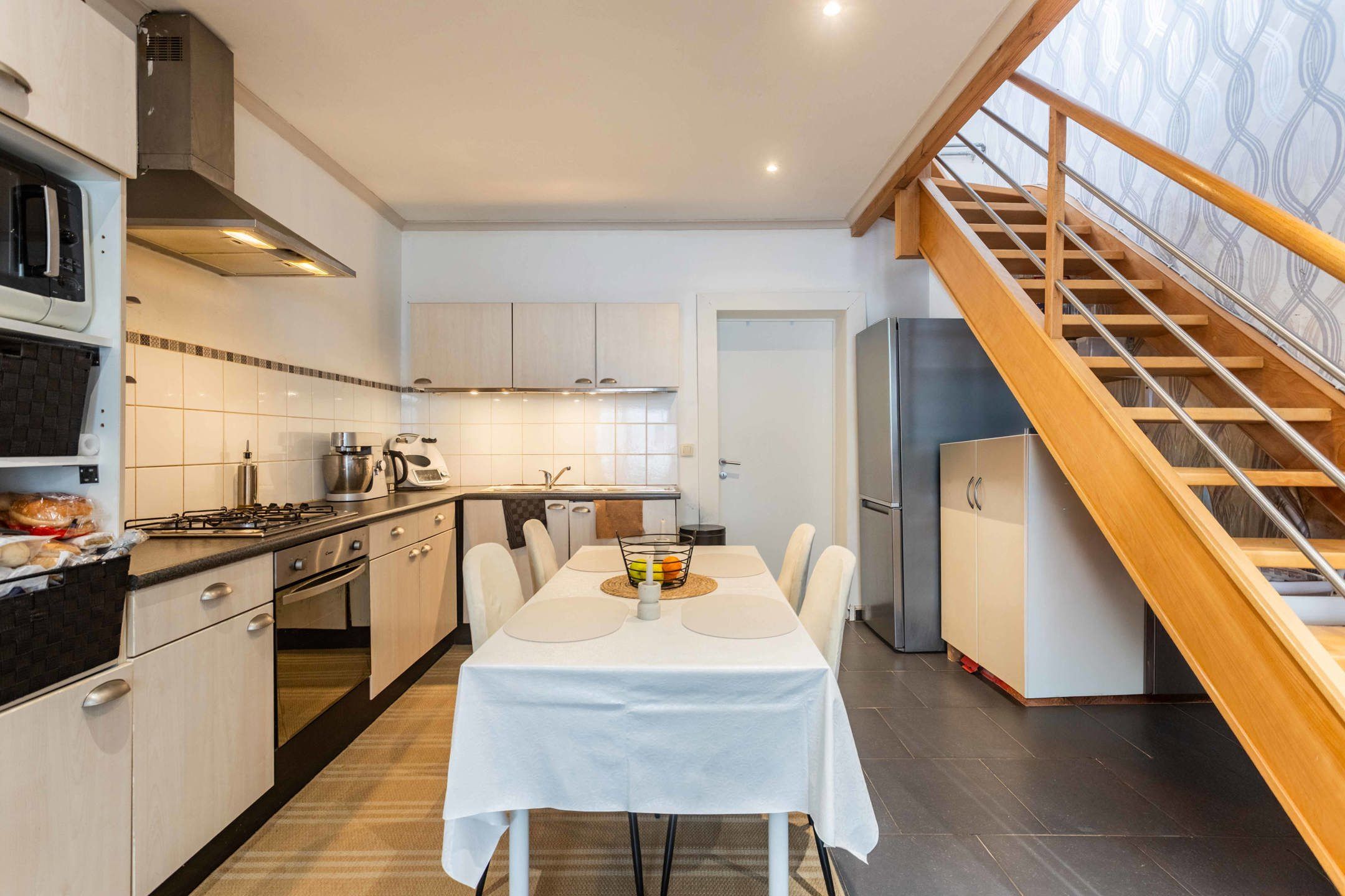 Interessante investering: verhuurde woning vlakbij centrum. foto 6