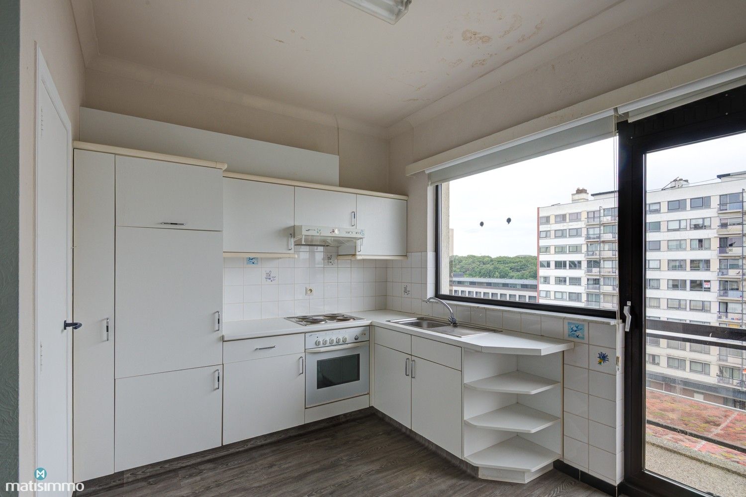 VOORTREFFELIJK GELEGEN APPARTEMENT MET GARAGEBOX EN 2 SLAAPKAMERS IN HARTJE GENK foto 7