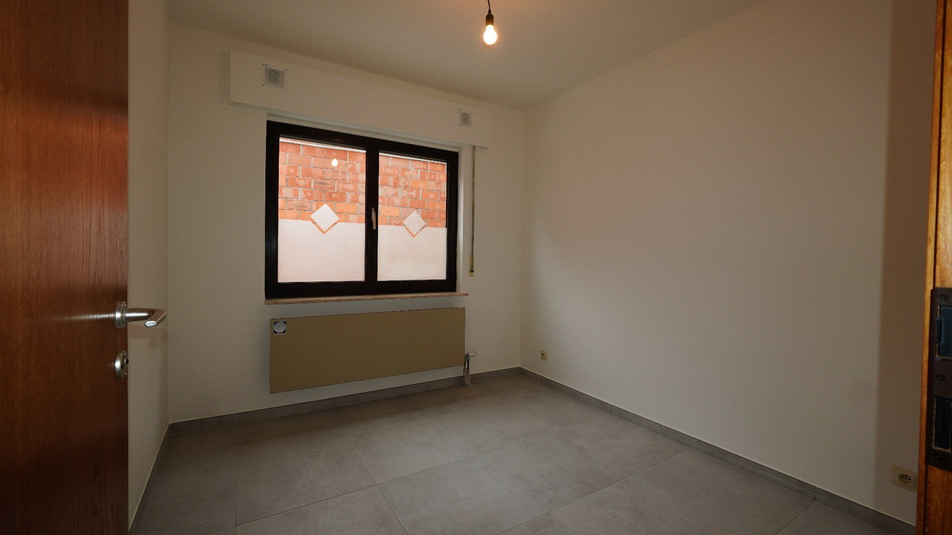 Gerenoveerd gelijkvloers appartement te Lokeren  foto 5