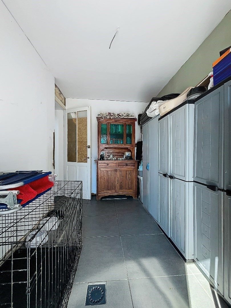 Unieke ruime stadswoning met verzorgde tuin, garage en 4 slaapkamers in Tienen. foto 17