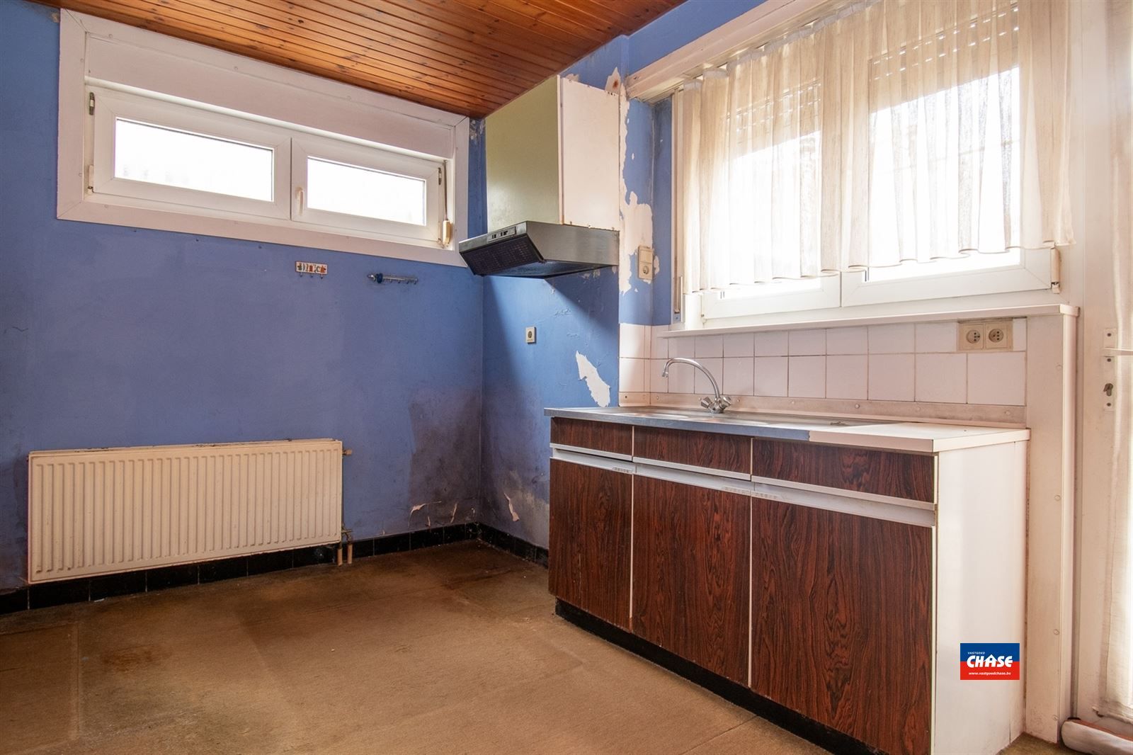 Te renoveren HOB met 2 slpks, tuin en garage foto 4