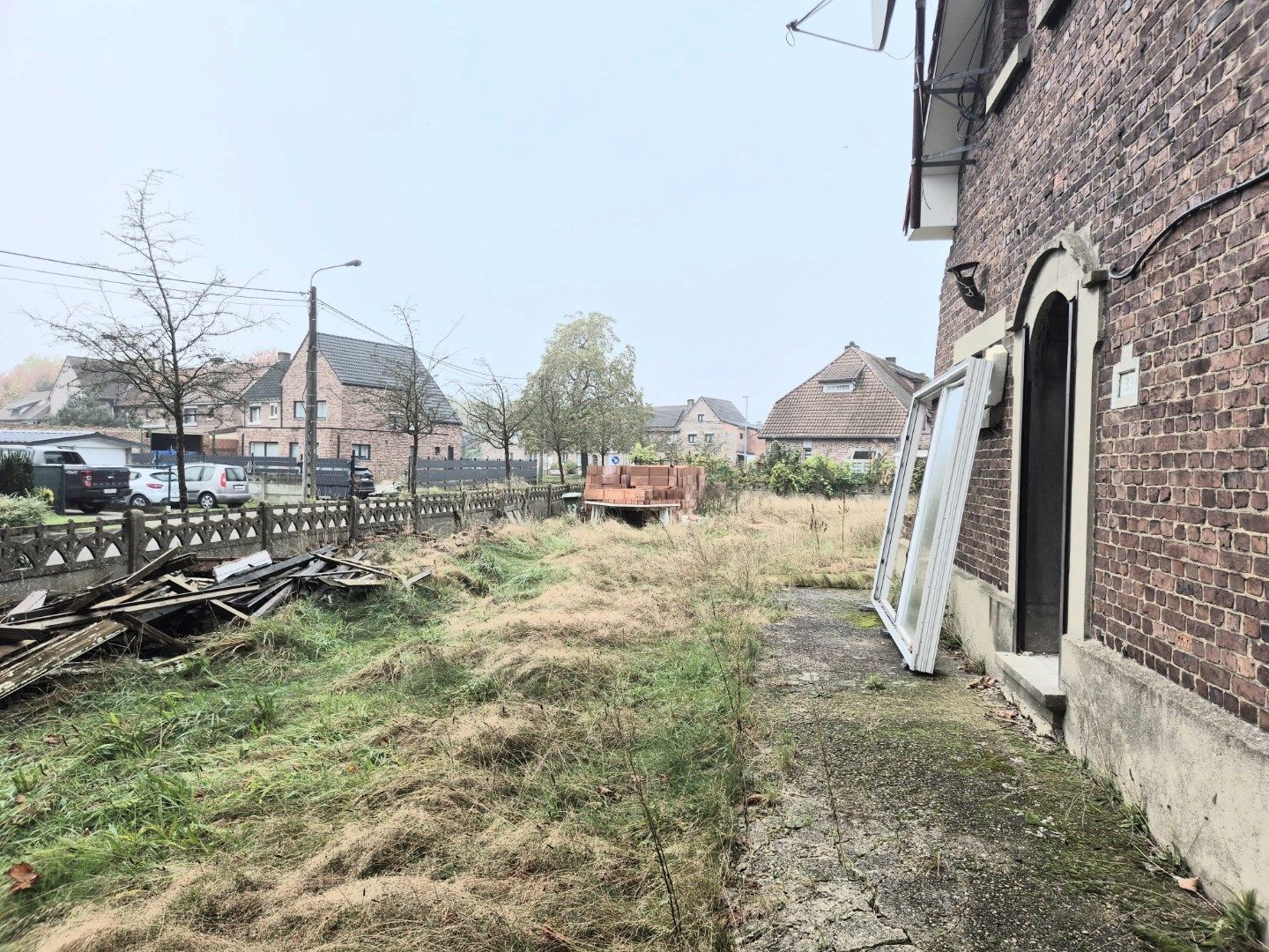 Karaktervolle tuinwijkwoning te koop in Genk: Maak uw droomproject waar! foto 16