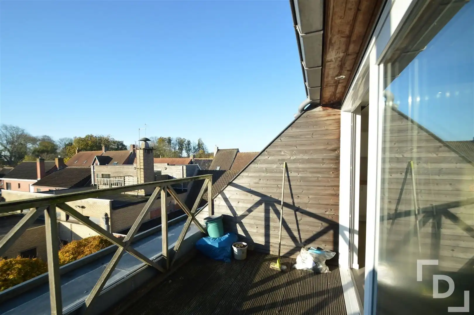 Dakappartement met zicht op het dorpsplein foto 4